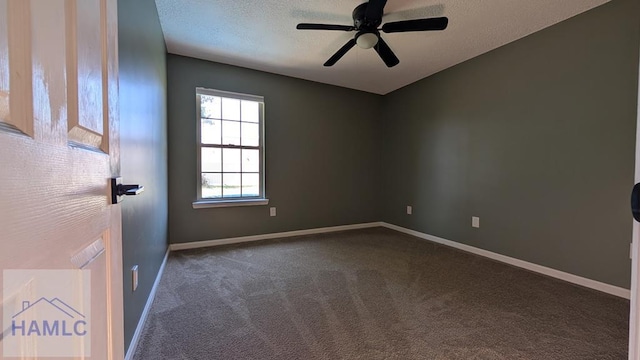 1942 Salisbury Way, Hinesville, GA 31313 - empty room featuring dark colored carpet, baseboards, ceiling fan, and a textured ceiling