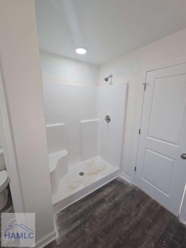 19 Cardinal Ln, Jesup, GA 31545 - bathroom with a shower and wood finished floors