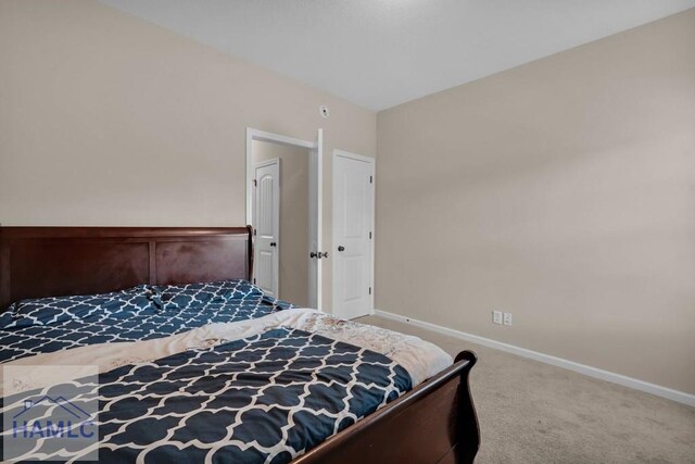 23 Veranda Trl, Midway, GA 31320 - carpeted bedroom with baseboards