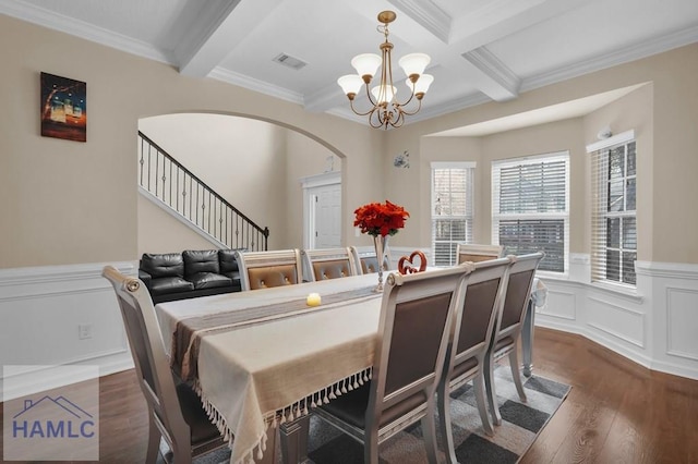 23 Veranda Trl, Midway, GA 31320 - dining area with a chandelier, beamed ceiling, arched walkways, dark wood-style flooring, and crown molding