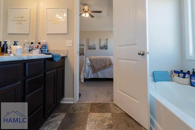 full bath with a bath, ceiling fan, connected bathroom, and vanity