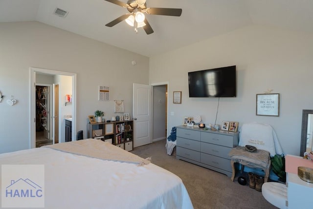 bedroom featuring a ceiling fan, light colored carpet, visible vents, and vaulted ceiling