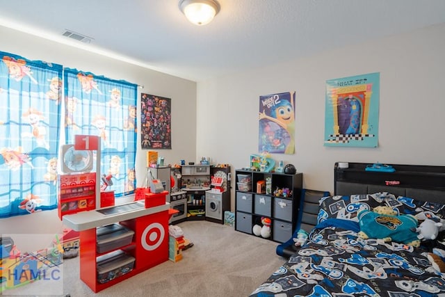 carpeted bedroom featuring visible vents