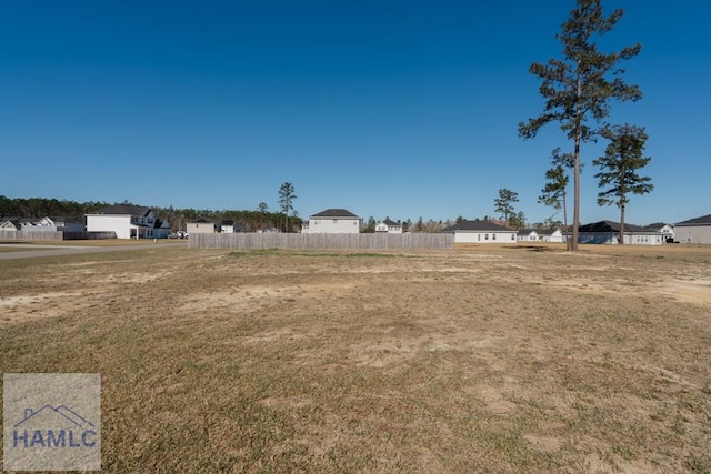 view of yard featuring fence