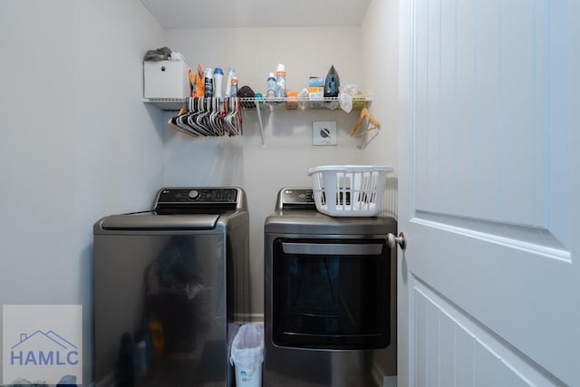 laundry room featuring laundry area and washing machine and dryer