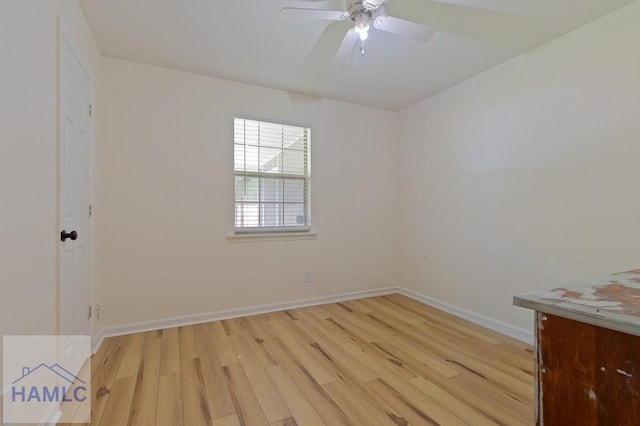 1453 Fritts Ct, Hinesville, GA 31313 - spare room with light wood-type flooring, baseboards, and a ceiling fan