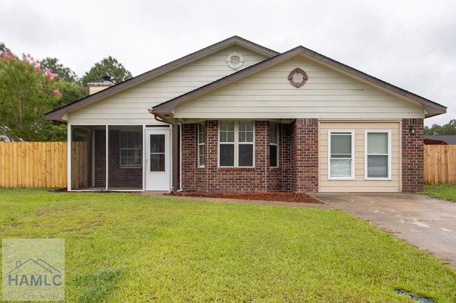 1453 Fritts Ct, Hinesville, GA 31313 - view of front of house with brick siding and a sunroom
