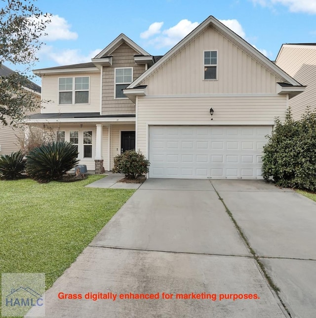 view of front of home featuring a garage and a front yard