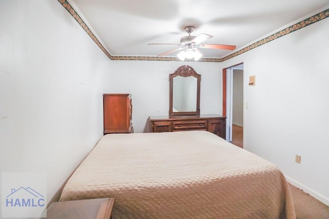 707 Church St, Claxton, GA 30417 - bedroom with carpet, baseboards, and a ceiling fan