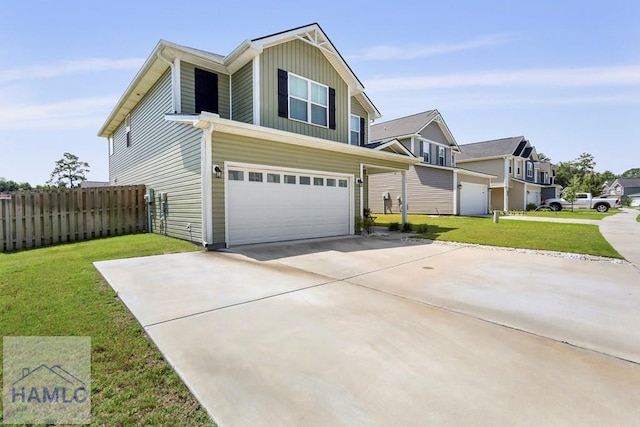 702 Fairview Cir, Hinesville, GA 31313 - traditional-style house featuring concrete driveway, board and batten siding, a garage, and a residential view
