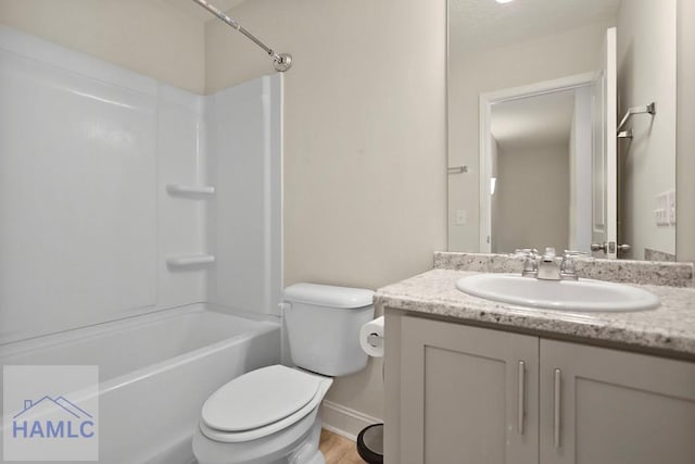 702 Fairview Cir, Hinesville, GA 31313 - bathroom featuring vanity, shower / bath combination, and wood finished floors