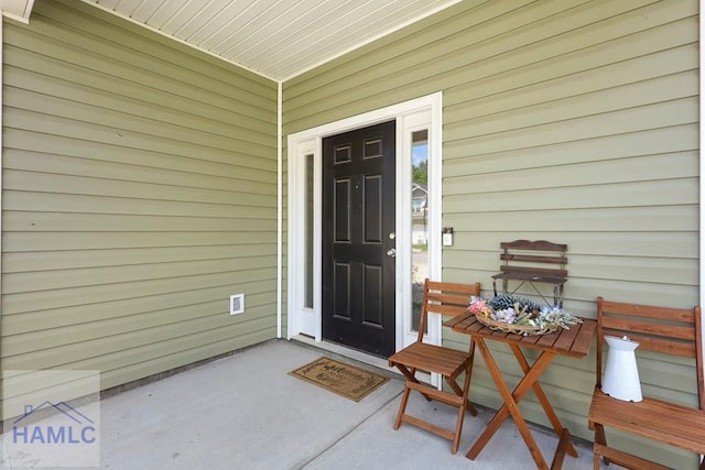 702 Fairview Cir, Hinesville, GA 31313 - view of exterior entry featuring covered porch