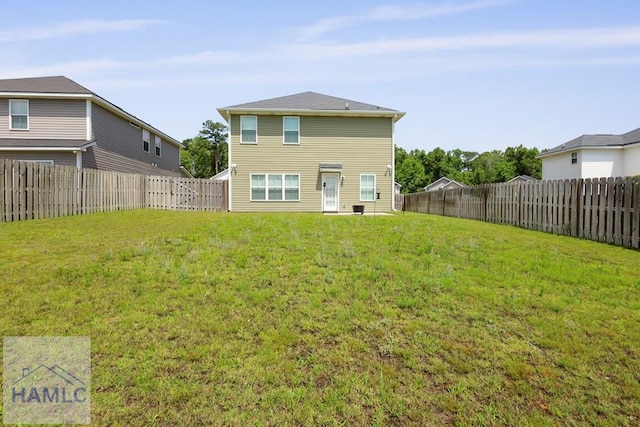702 Fairview Cir, Hinesville, GA 31313 - rear view of house with a fenced backyard