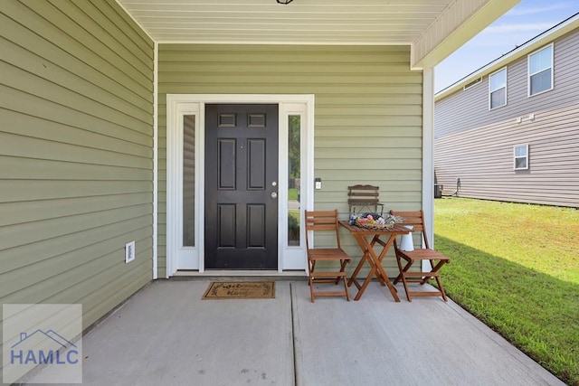 702 Fairview Cir, Hinesville, GA 31313 - doorway to property featuring a lawn