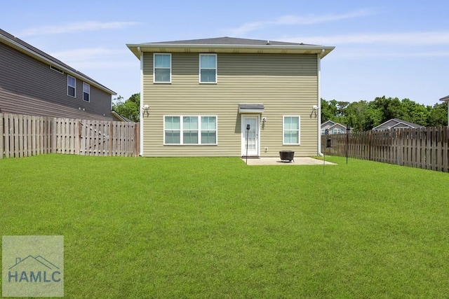 702 Fairview Cir, Hinesville, GA 31313 - back of house with a patio and a fenced backyard