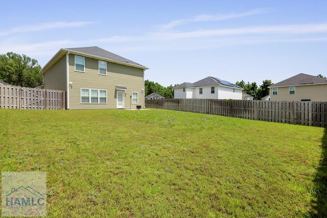 702 Fairview Cir, Hinesville, GA 31313 - back of house with a fenced backyard