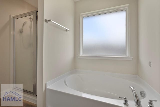 702 Fairview Cir, Hinesville, GA 31313 - bathroom featuring a shower stall and a garden tub