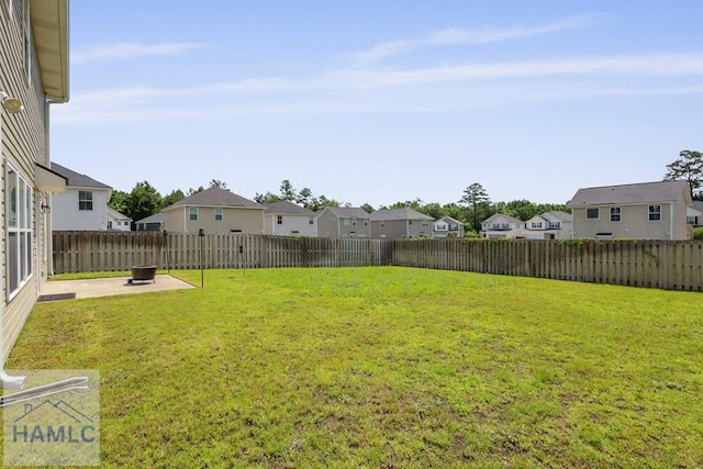 702 Fairview Cir, Hinesville, GA 31313 - fenced backyard featuring a residential view and a patio