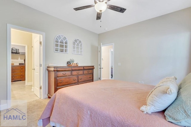 bedroom featuring ceiling fan and light colored carpet