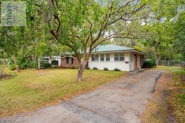 view of front of home with a front yard