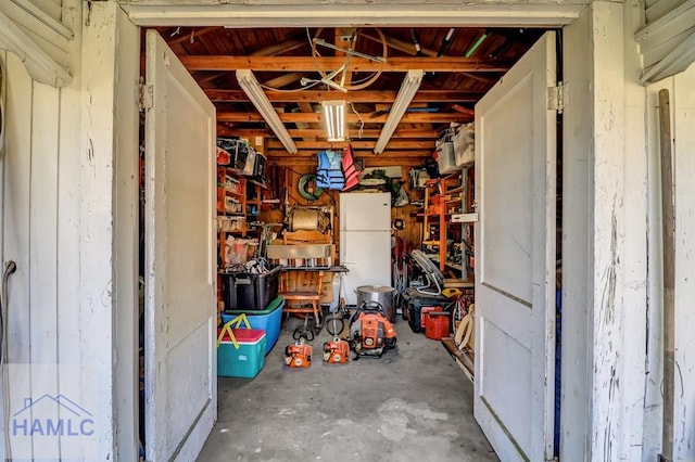 garage with freestanding refrigerator