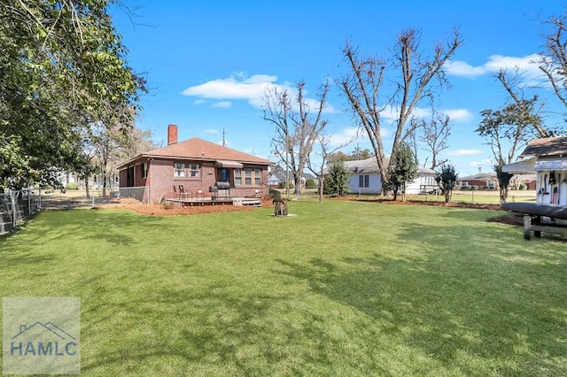 view of yard with fence