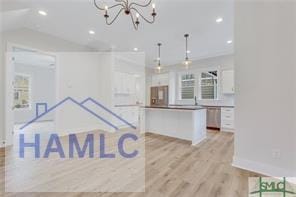 49 Salt Marsh Dr, Midway, GA 31320 - interior space featuring light wood-style floors, a chandelier, recessed lighting, and vaulted ceiling