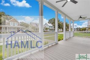 49 Salt Marsh Dr, Midway, GA 31320 - wooden terrace featuring ceiling fan