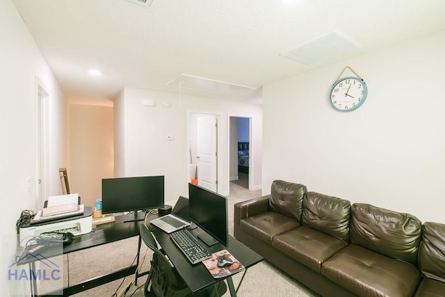 living room featuring light colored carpet