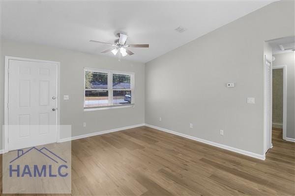 spare room featuring ceiling fan and wood-type flooring