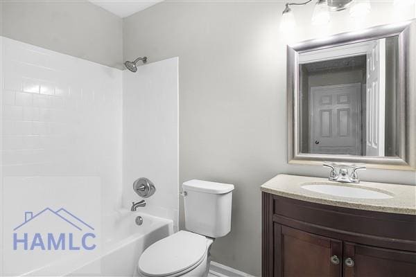 1110 Ricade Dr, Hinesville, GA 31313 - full bath featuring toilet, vanity, baseboards, and shower / bathtub combination