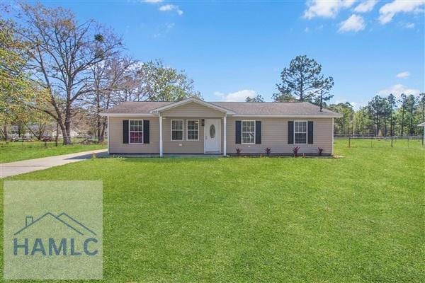 1110 Ricade Dr, Hinesville, GA 31313 - ranch-style home with a front yard