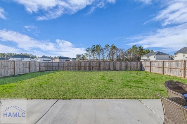 view of yard with a patio area