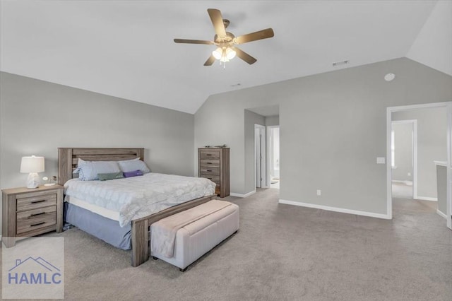 bedroom with lofted ceiling, ceiling fan, and carpet