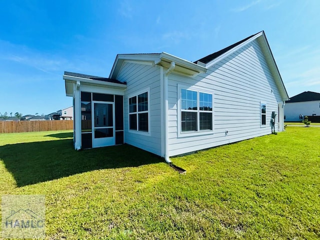 173 Akins Ranch Rd NE, Ludowici, GA 31316 - back of property with a sunroom