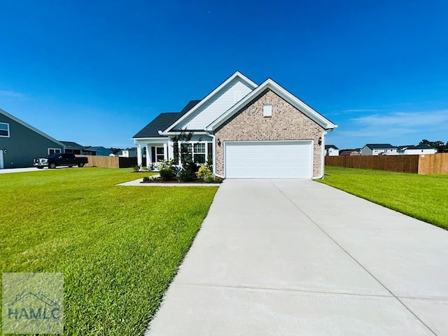 173 Akins Ranch Rd NE, Ludowici, GA 31316 - single story home featuring brick siding, concrete driveway, and a garage