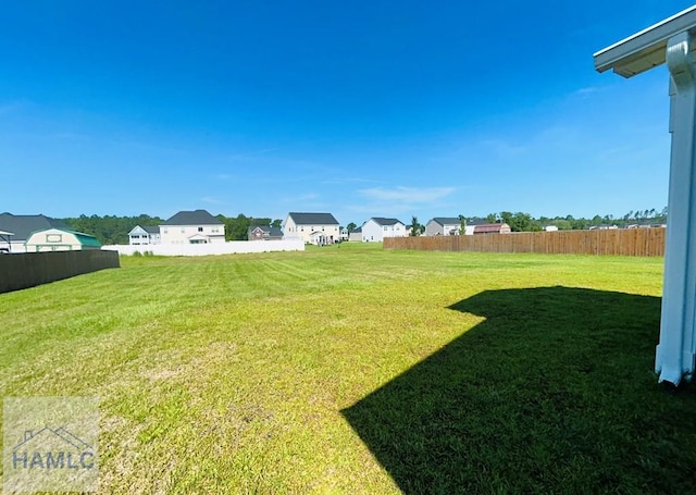 173 Akins Ranch Rd NE, Ludowici, GA 31316 - view of yard with a residential view
