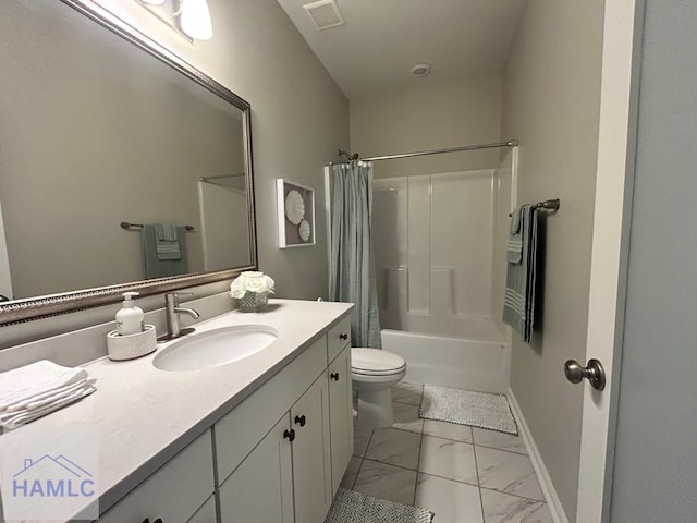 173 Akins Ranch Rd NE, Ludowici, GA 31316 - bathroom with marble look tile flooring, vanity, and shower / bath combo with shower curtain
