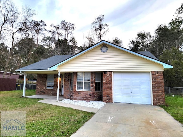 ranch-style house featuring brick siding, driveway, and a front lawn