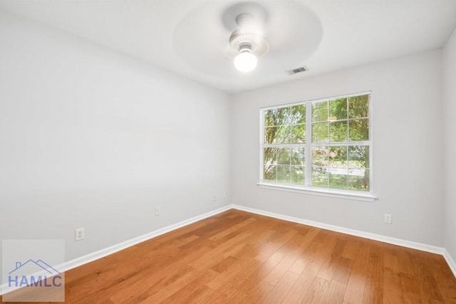 24 Stalwick Dr, Pooler, GA 31322 - empty room with a ceiling fan, baseboards, and wood finished floors