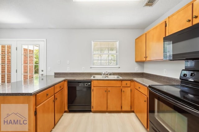 24 Stalwick Dr, Pooler, GA 31322 - kitchen with black appliances, a sink, plenty of natural light, and a peninsula