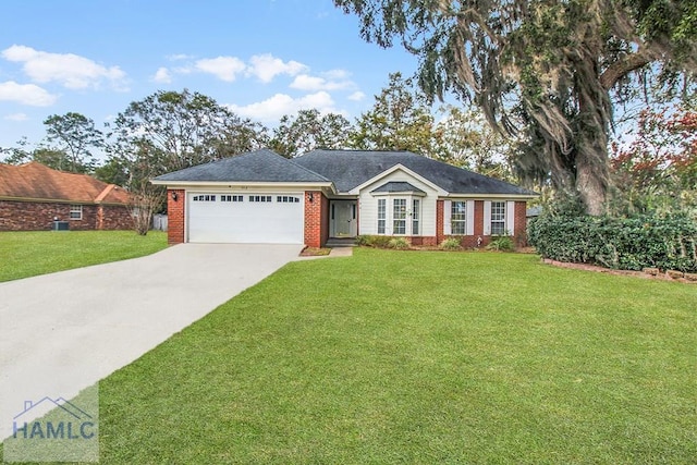 ranch-style home with a front lawn, an attached garage, brick siding, and driveway