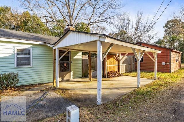 exterior space featuring a carport