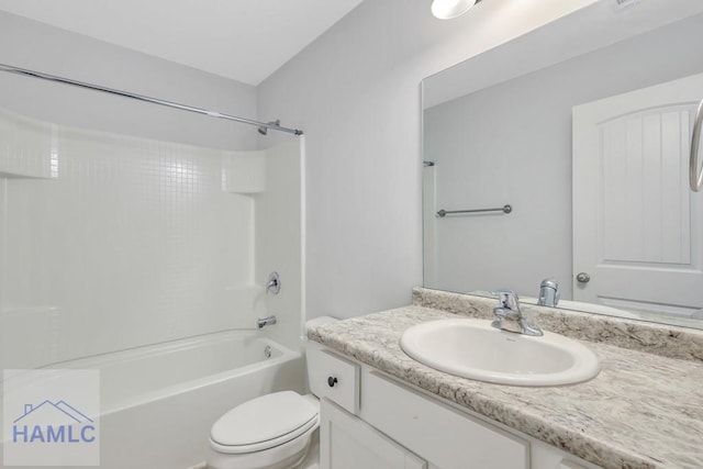 full bathroom with vanity, toilet, and shower / bathtub combination