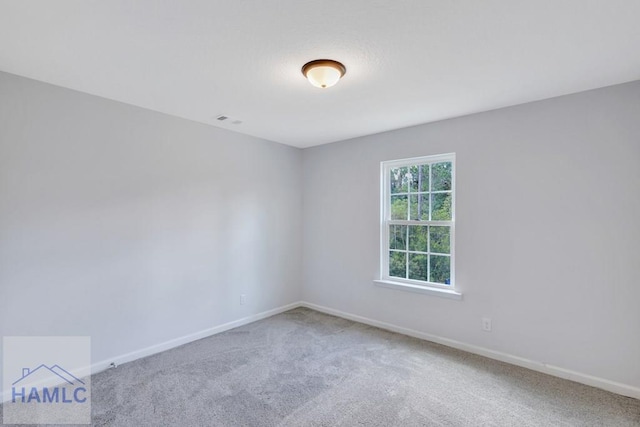 unfurnished room featuring carpet floors