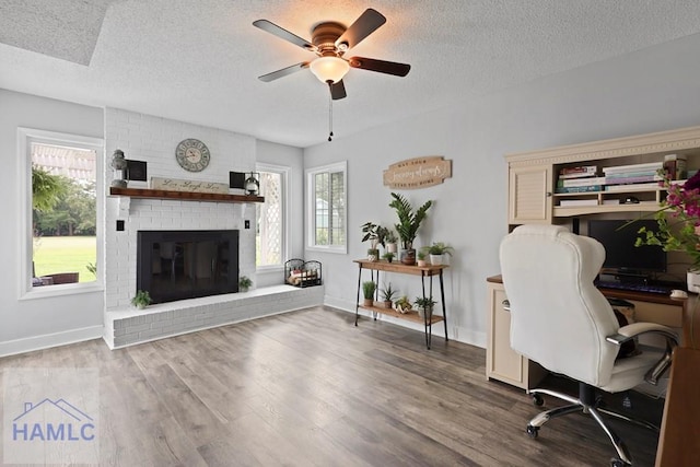 226 Topi Trl, Hinesville, GA 31313 - office space with ceiling fan, a textured ceiling, plenty of natural light, baseboards, and wood finished floors