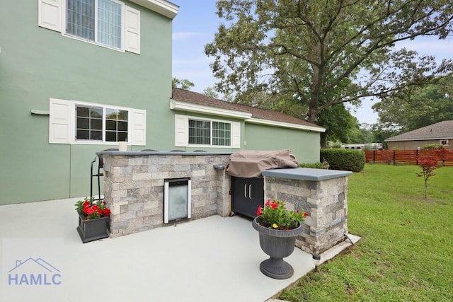 226 Topi Trl, Hinesville, GA 31313 - view of patio / terrace with an outdoor kitchen