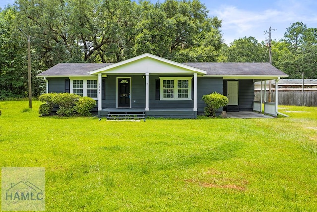 1869 Freedman Grove Rd, Fleming, GA 31309 - view of front facade with covered porch and a carport