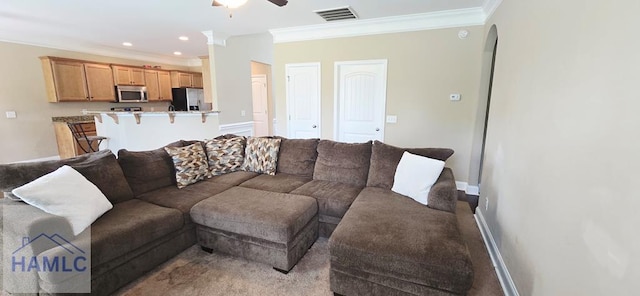 14 Cantebury Rd, Ludowici, GA 31316 - living area featuring ornamental molding, a ceiling fan, arched walkways, and recessed lighting