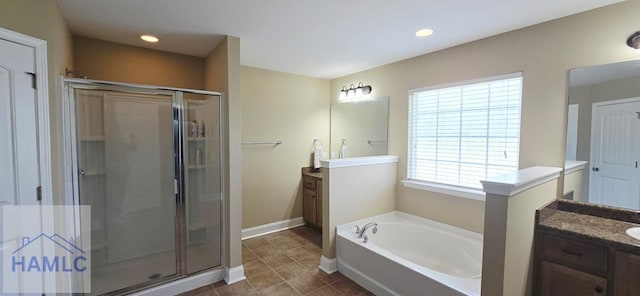 14 Cantebury Rd, Ludowici, GA 31316 - full bath with vanity, a stall shower, a bath, and recessed lighting